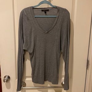 Luxurious cotton long sleeve top. Has a super cute cut with a slight bat wing.